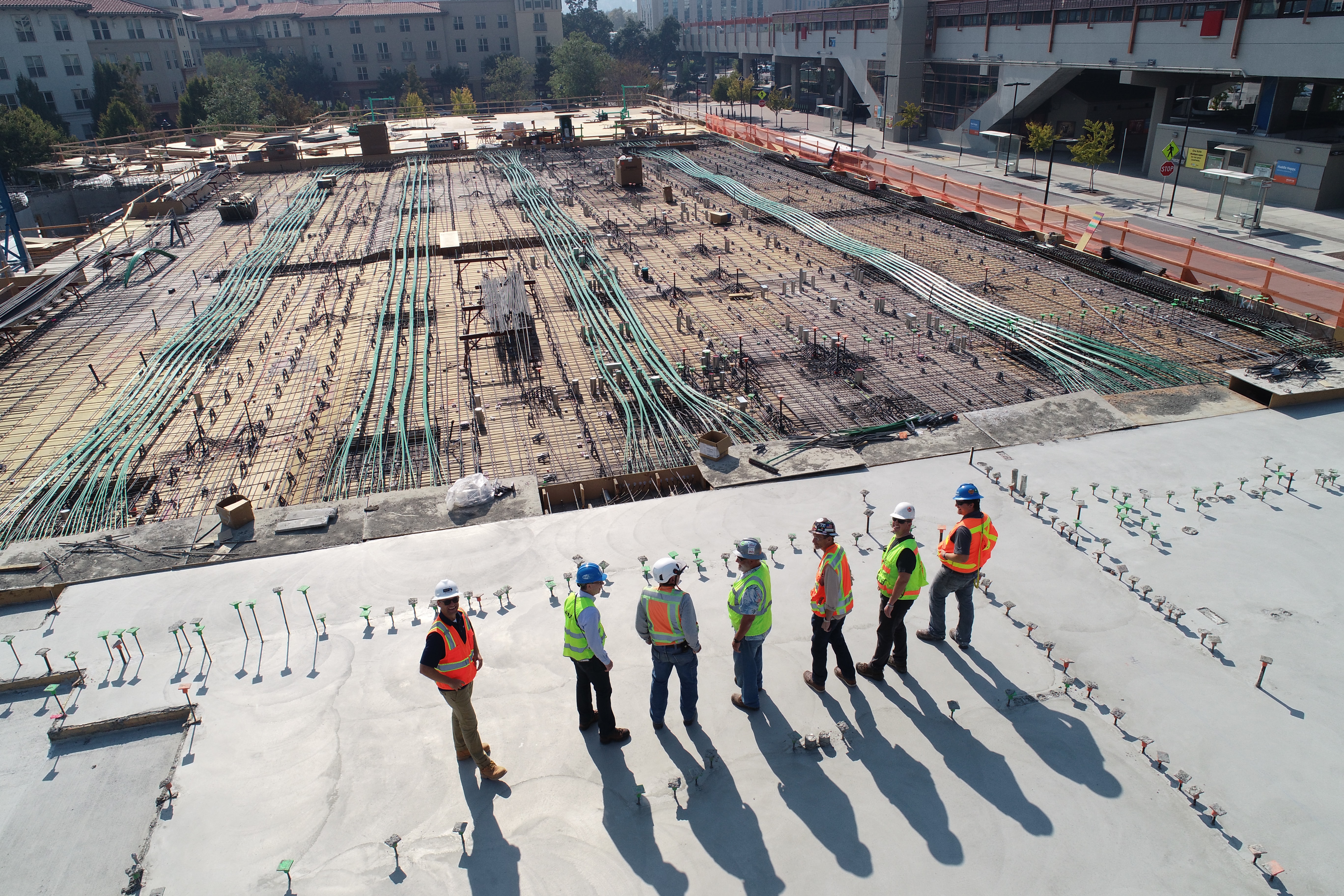 workers on a large commercial construction site